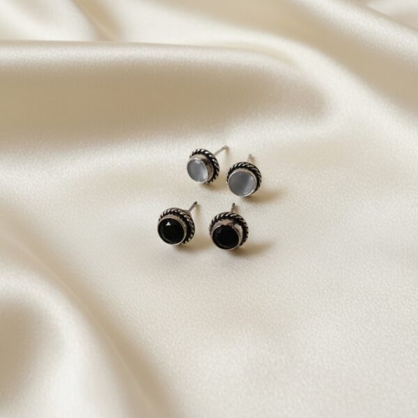 Black and grey oxidized round Monalisa stone stud earrings combo with twisted rope-style border design.