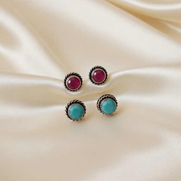 Mint green and red oxidized round Monalisa stone stud earrings combo with twisted rope-style border design.