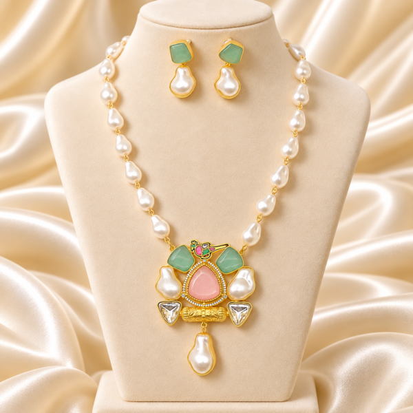 Pink and mint pastel stone and pearl pendant necklace set with matching drop earrings and a decorative gold-tone statement pendant.